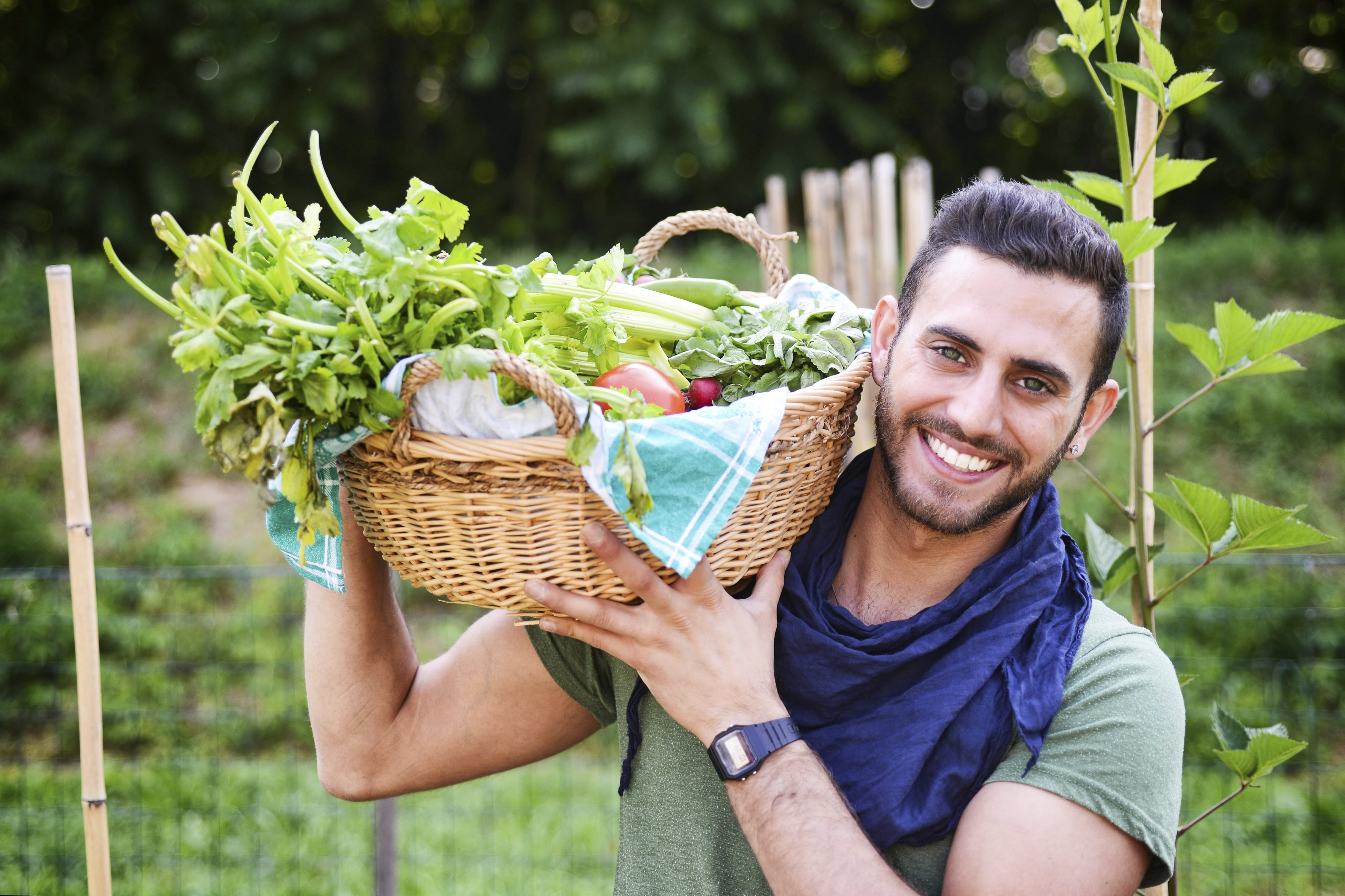 man_in_garden_with_basket